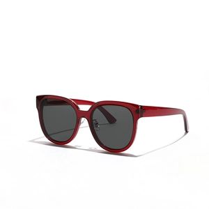 Retro oversized square sunglasses with dark red transparent frames and black lenses