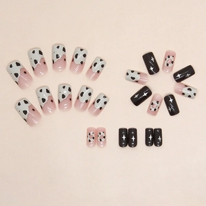 Chocolate doughnut style short square press-on nails with cow print and star designs