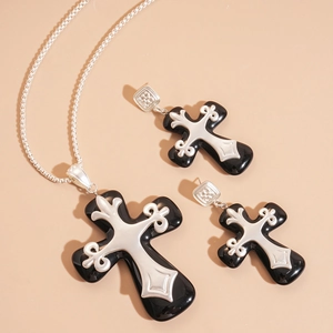 Gothic resin cross necklace and earrings set with vintage silver metal detailing