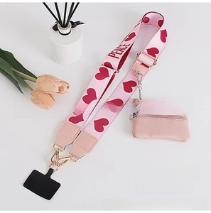 Detail of light pink phone crossbody strap with red hearts and PEACE text on white background