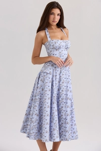 Detail of floral print maxi dress with button-down front and cinched waistline