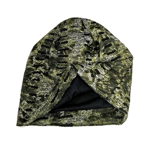 Army green camo knit beanie with distressed hole details and warm black lining