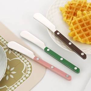 304 stainless steel butter knives with colorful handles and rivets in breakfast setting