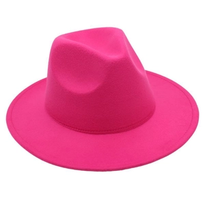 Detail view of the rose red wide brim wool fedora hat with classic crown indentation