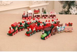 Detailed close-up of four wooden Christmas train ornaments with festive holiday figurines