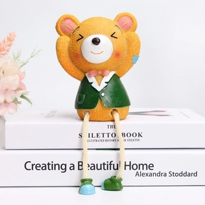 Cute resin bear figurine in green suit sitting on books for creative home decor