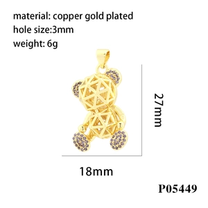 Detail view of 27mm gold bear pendant with dimensions, aperture, and weight specs