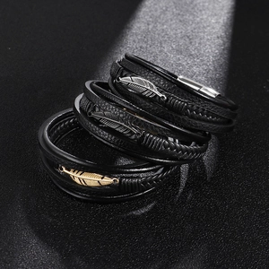 Men's multi-layer black leather braided bracelet with metallic feather charms and magnetic clasp