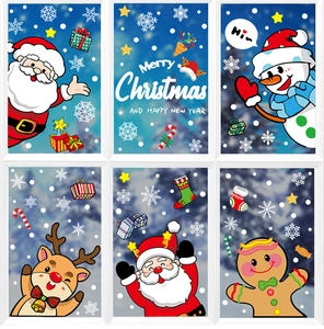 Festive Christmas window decals featuring Santa, reindeer and snowflakes on glass