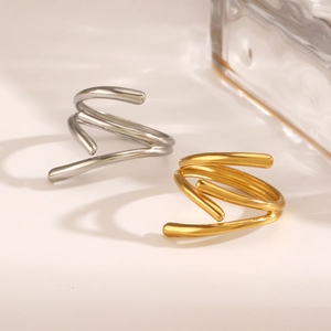 Minimalist spiral wrap open rings in polished gold and silver finishes for women