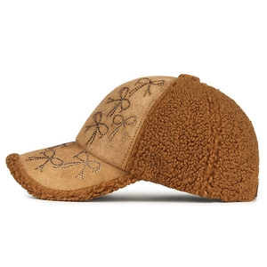 Winter faux suede and plush baseball cap with sparkling rhinestone bow details in brown