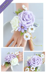 Detail of lilac purple and white faux rose wrist corsage with ribbon for weddings