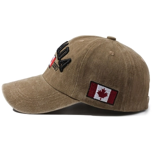 Vintage khaki cotton baseball cap with Canada embroidery and flag on a white background