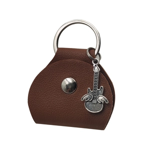 Brown leather guitar pick case with a silver guitar pendant and secure metal ring