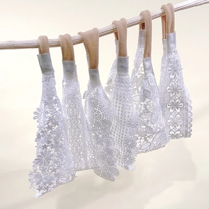 Detailed set of white floral lace headbands with soft nylon elastic for baby girls
