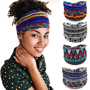 Detail of four colorful African print elastic headbands with geometric patterns