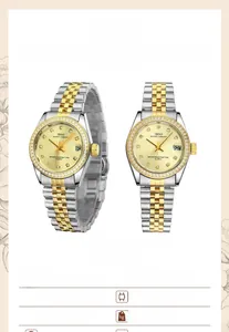 Detail of luxury quartz watch featuring two-tone steel band and diamond bezel