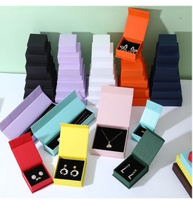 Macro shot of assorted magnetic flip jewelry gift boxes in various colors and sizes