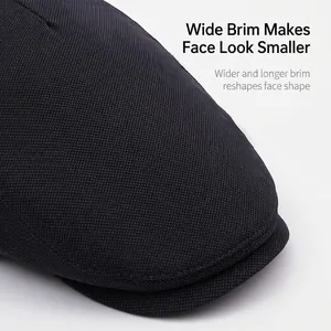 Classic dark grey flat cap featuring a wide brim for face contouring and sun protection