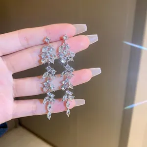 Silver needle geometric tassel earrings with pearls and marquise cut cubic zirconia