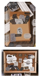 Close-up of vintage aesthetic stickers with floral and angel motifs for scrapbooking