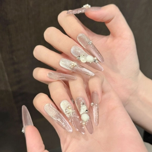 Handmade cat eye press-on nails with pink 3D shells, pearls and starfish charms
