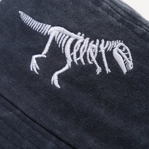 Washed cotton bucket hat with detailed white dinosaur skeleton embroidery for men