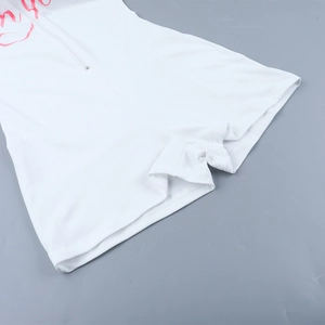 Detail of front zipper and pink print on white fitted athletic bodysuit for women