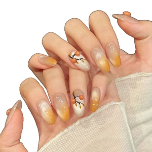 Handmade almond press-on nails with orange gradient, 3D fruit relief and pearl finish