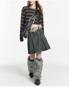 Model showcasing a large black vintage tote bag styled with Y2K aesthetic outfit