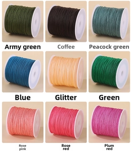 Detailed close-up of 0.8mm nylon cord spools in nine vibrant colors for jewelry making