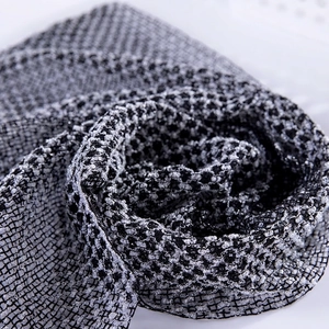 Kinbata double-sided exfoliating bath towel with a black and white mesh texture for back scrubbing