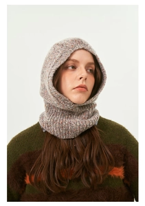 Detailed close-up of grey marled yarn texture and ribbed edge of the knitted balaclava