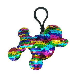 Rainbow sequin dog-shaped keychain with colorful fish scale patterns and a black hook