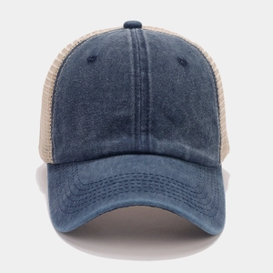 Detail of vintage navy denim trucker hat with breathable beige mesh for sun protection