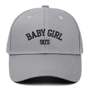 Light gray cotton baseball cap with BABY GIRL 90'S black embroidery and curved brim