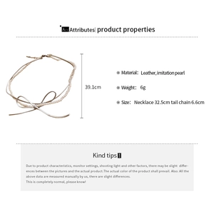 Detailed view of leather bow and imitation pearl necklace with size and material specs