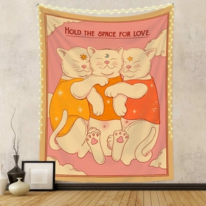 Detail of bohemian cat tapestry with warm lights hanging on a textured wall