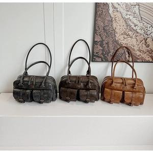 Three retro Boston shoulder bags in dark grey, dark brown, and light brown faux leather