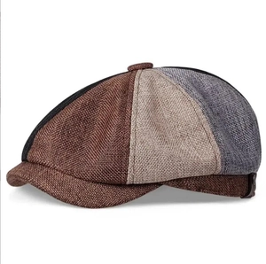 Detail of multi-color patchwork linen newsboy cap with breathable textured fabric