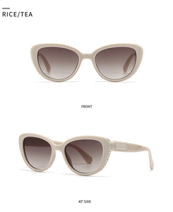 Front and side view of cat-eye sunglasses with rhinestone trim and gradient lenses