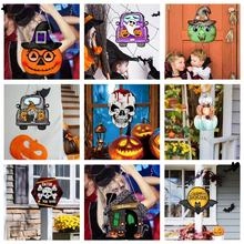 Set of 9 luminous Halloween hanging signs including pumpkin and haunted house designs