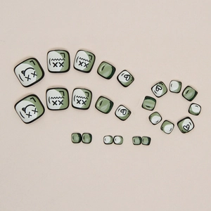 Avocado green 2D comic style press-on toenails with cute cartoon faces and heart patterns