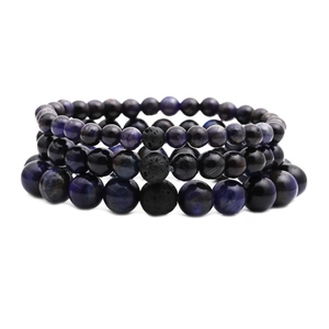 Three-piece tiger eye and volcanic lava stone beaded bracelet set on white background