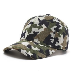 Detail view of a camouflage baseball cap showing knit texture and six-panel stitching