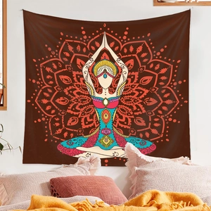 Cozy bedroom setting showing the bohemian mandala tapestry hanging as wall decor