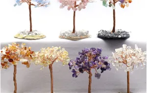 Handmade wire-wrapped crystal tree collection featuring amethyst and colorful quartz stones