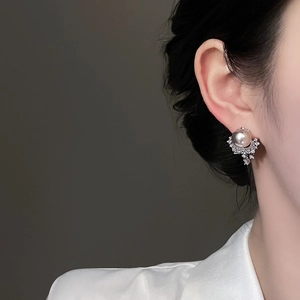 Elegant silver pearl drop earrings with sparkling pavé crystals for a refined look
