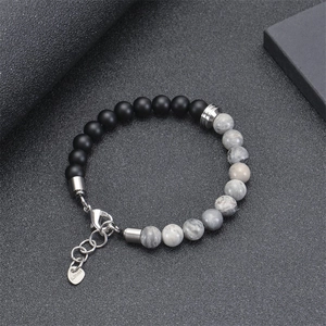 Detail of 8mm natural map stone bracelet with stainless steel lobster clasp and chain