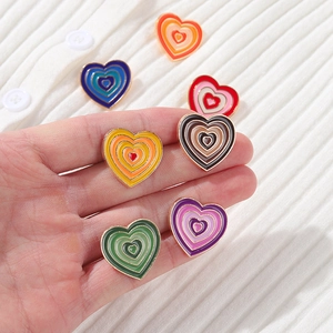 Rainbow gradient heart enamel pins with gold metal borders for clothing and bags